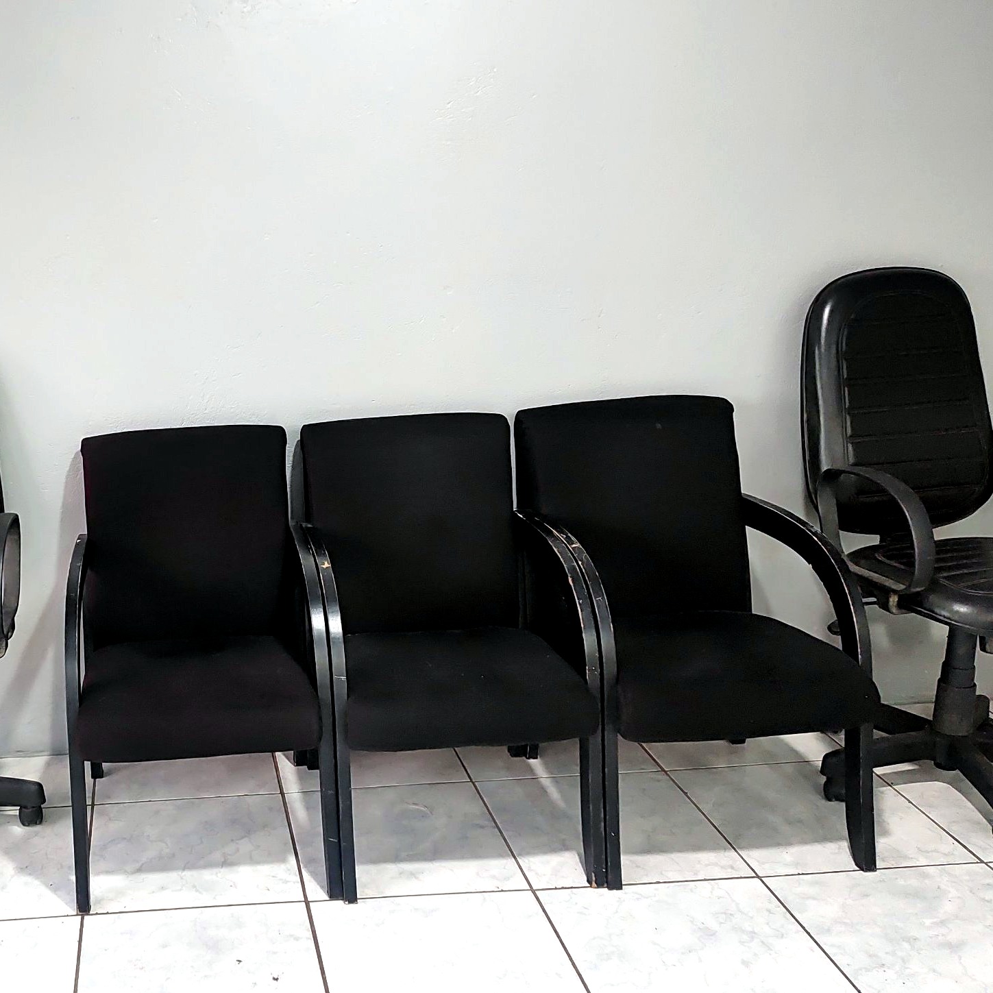 Área de espera da UP Barbearia